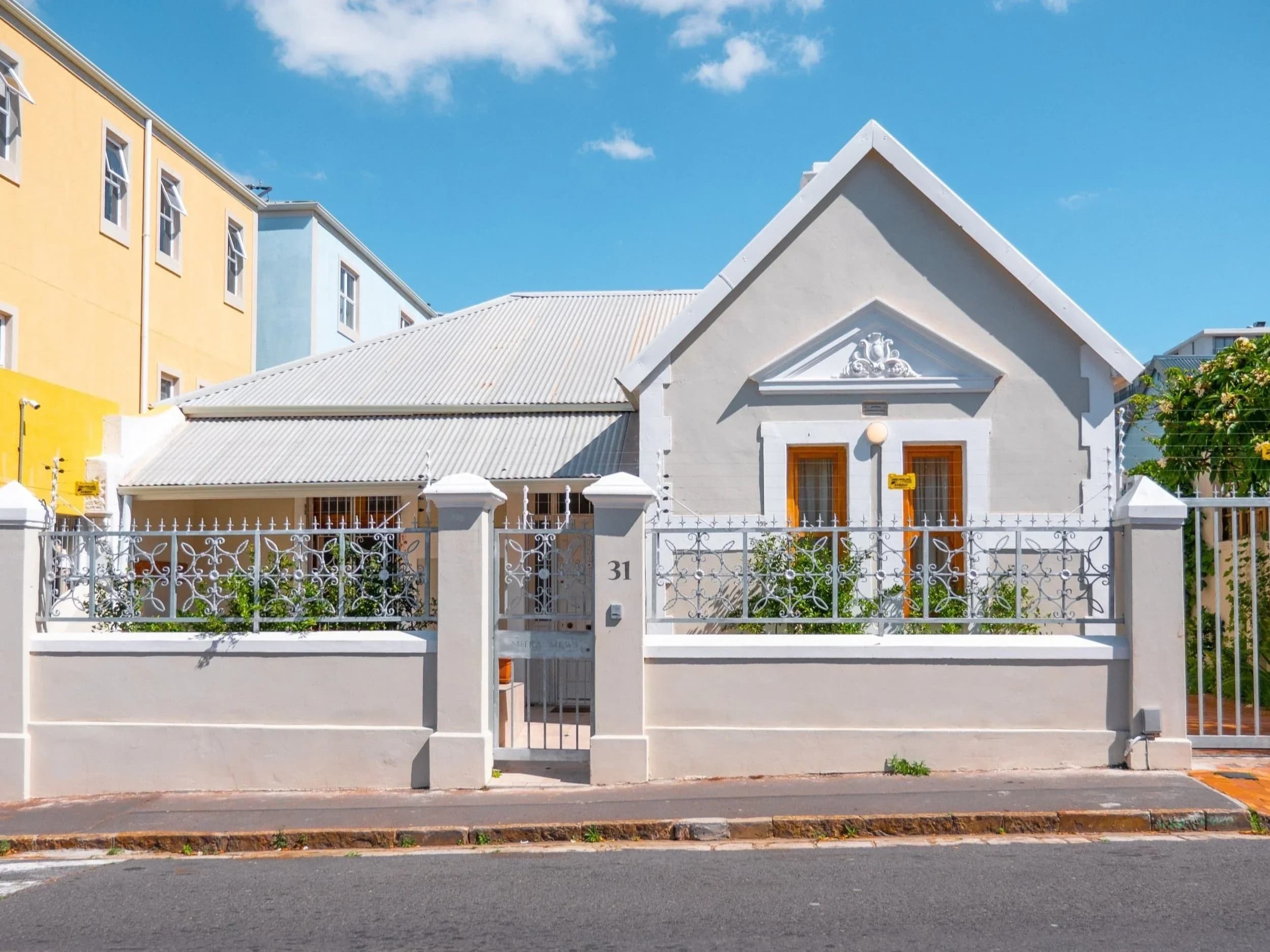 Street view of the restored Victorian cottage at Mitra Mews, Unit 9